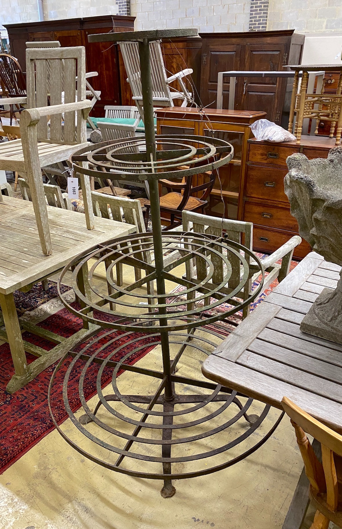 A 19th century four tier circular wrought iron plant stand, diameter 109cm, height 166cm